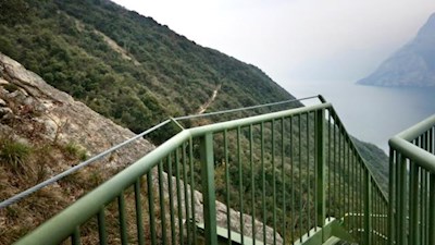 The metal stairs lead safely over the steep rock walls