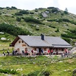 The Langalm mountain hut made of light natural stone