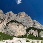 The climb to the rifugio Scotoni mountain hut is surrounded by mighty rock walls