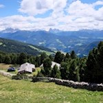On the opposite side rise the Dolomites