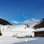 Die Taistner Alm vor der Kulisse des Rudlhorn