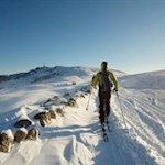 Im Hintergrund erblickt man bereits die Messstation auf dem Rittner Horn 