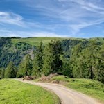 Rückwärts gewandter Blick auf den Puflatsch während des Anstiegs zur Gstatsch Schwaige