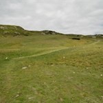 Durch weite Almwiesen auf das Sattele