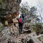 Close to the rock walls the path winds to Pregasio