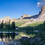 Croda da Lago moutain hut on Lago Federa lake