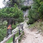 Prima section of the trail leads through rocky terrain