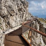 A metal footbridge leads to the small Lagazuoi