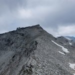 Das Gipfelkreuz des Kraxentrager ist bereits in Sicht