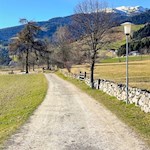 The panoramic trail gently winds its way through wide fields