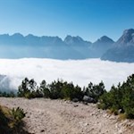 Literally above the clouds, the mountain trail winds its way to Città di Carpi mountain hut