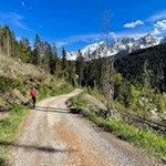 Through forests and meadows to lake Carezza
