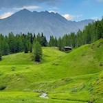 Die Valtiglalm liegt inmitten einer märchenhaften Almlandschaft