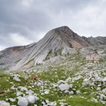 The rifugio Biella mountain hut at the foot of Croda del Becco peak