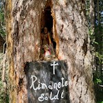 Signs of faith and devotion on the way to the Valparola mountain hut
