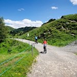 Auch Mountainbiker suchen die Almrosenhütte gerne auf