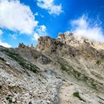 Auf dem geröllbeladenen Steig in Richtung Rosszahnscharte