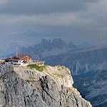 Rifugio Lagazuoi mountain hut perched boldly on the Lagazuoi