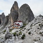At-the-foot-of-the-Torre-Wundt-the-rifugio-Fonda-Savio-mountain-hut-invites-you-to-table